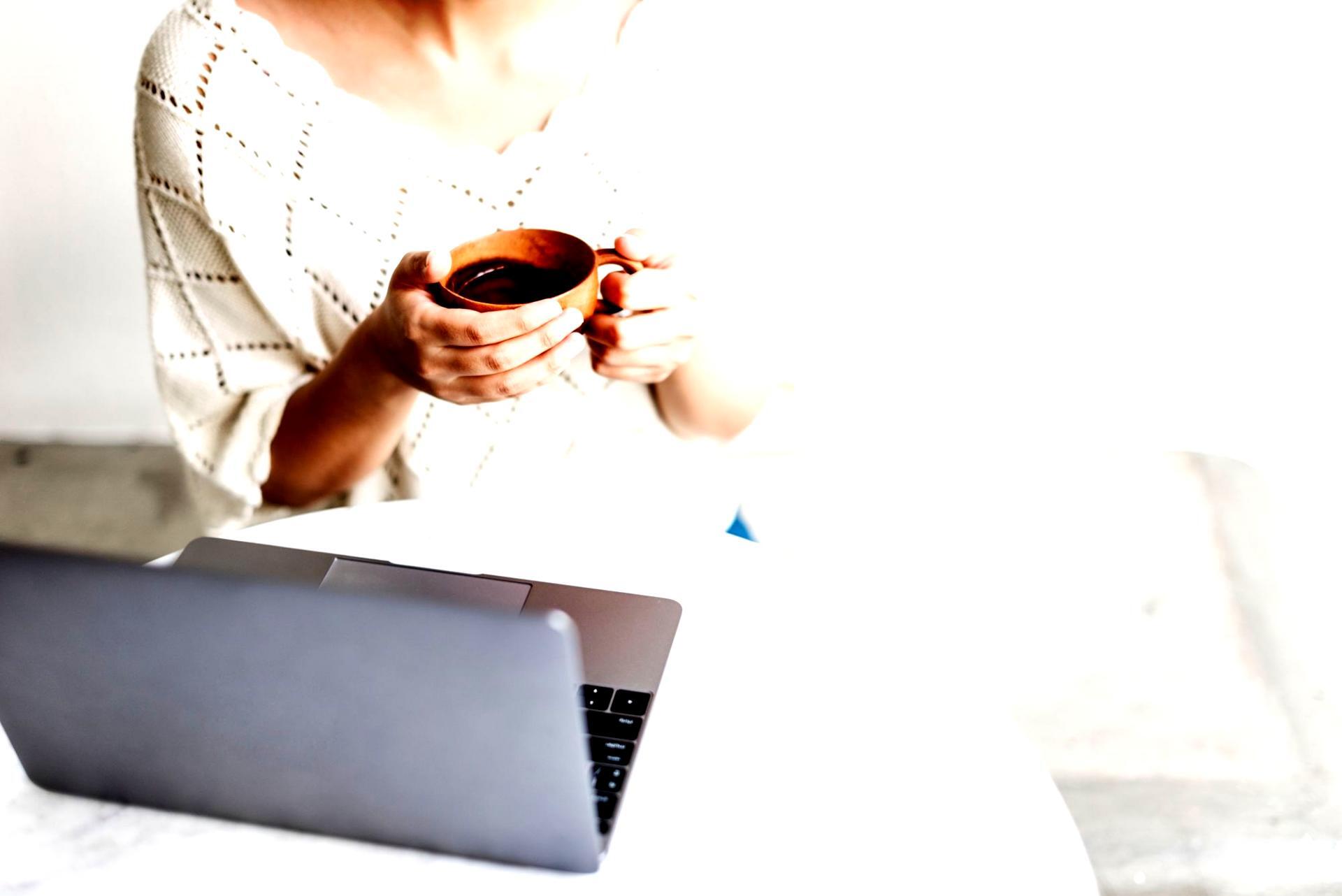 Instructor reviewing financial data with a learner online